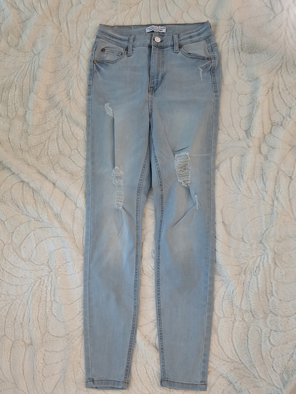Celebrity Pink Light Wash Distressed Skinny Jeans